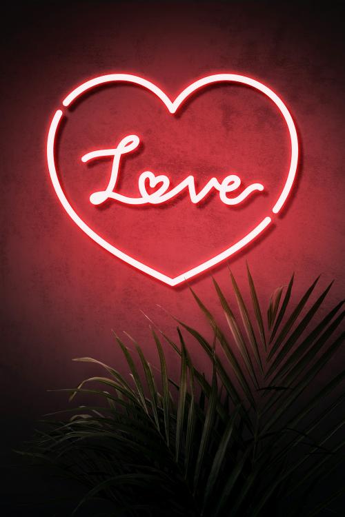Neon red heart frame with love on a wall - 894312