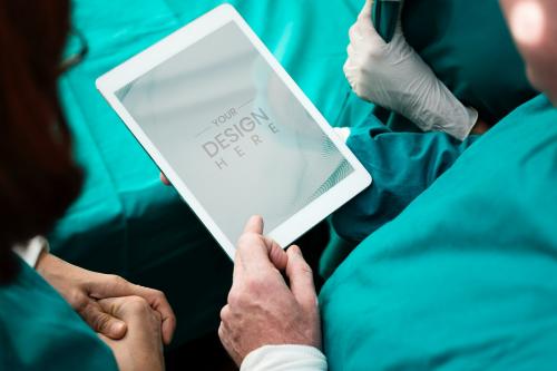 Surgeon using a digital tablet mockup - 894840