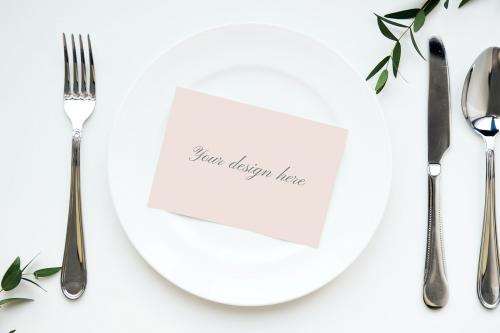 Pink paper mockup on a white plate - 894894