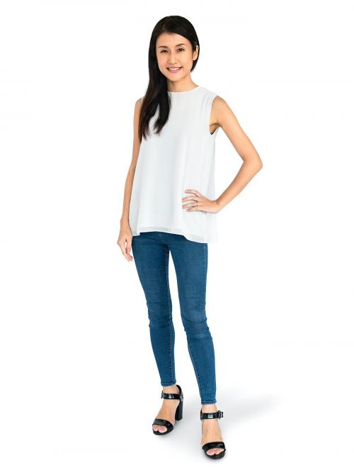 Cheerful Asian woman in jeans character isolated on a white background - 591438