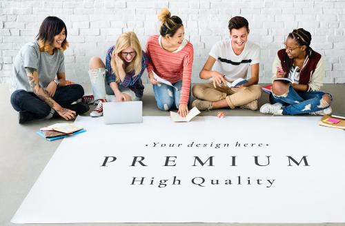 Young students working on a poster mockup - 666146