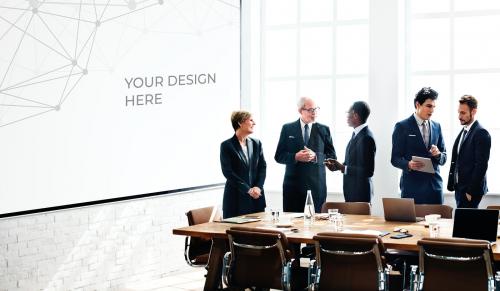 Diverse business people in a meeting with a board mockup - 666183