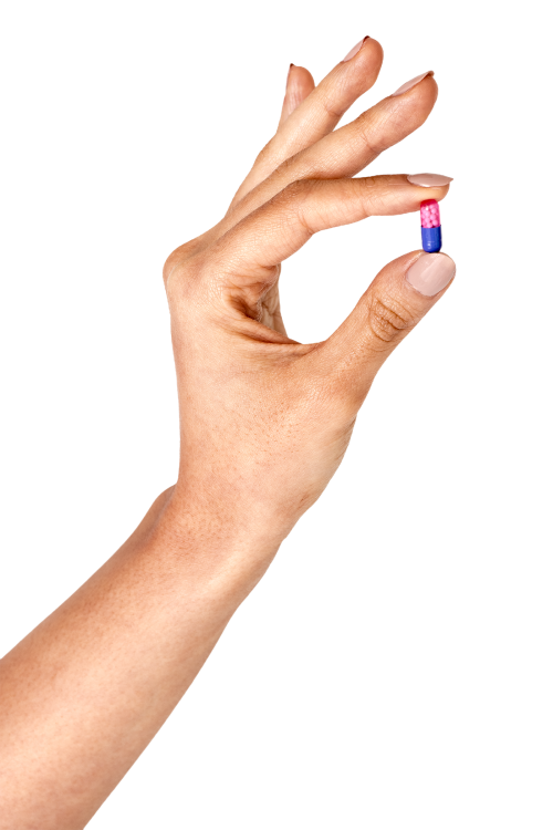 Hand holding a pink and blue pill transparent png - 2053007
