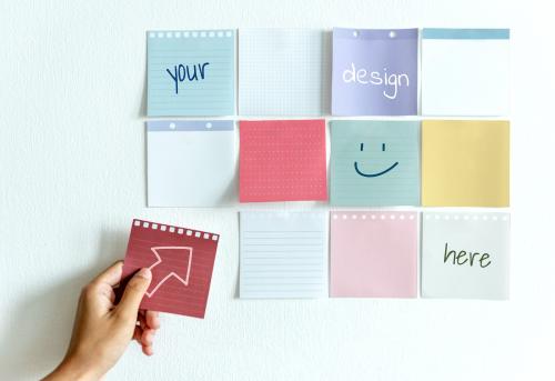 Sticky note mockups on a white wall - 580920