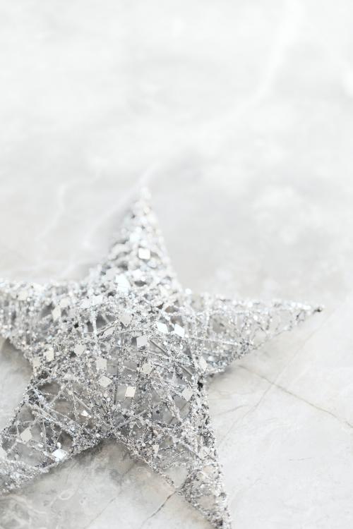 Silver wire Christmas star on marble background - 2035504
