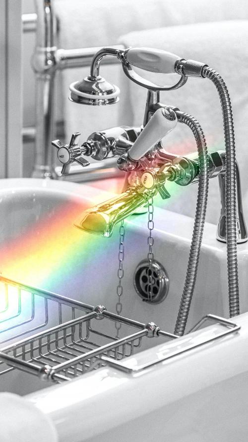Clean hotel bathroom with rainbow mobile phone wallpaper - 2042611