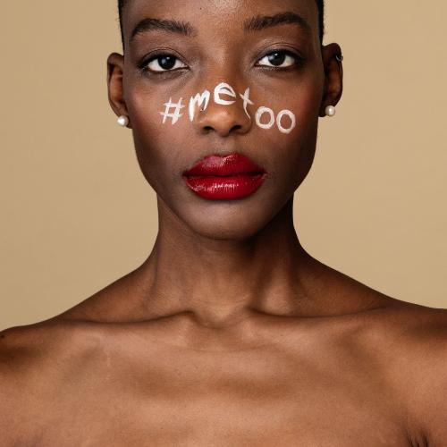 Hashtag metoo on an African American woman's face - 2250011