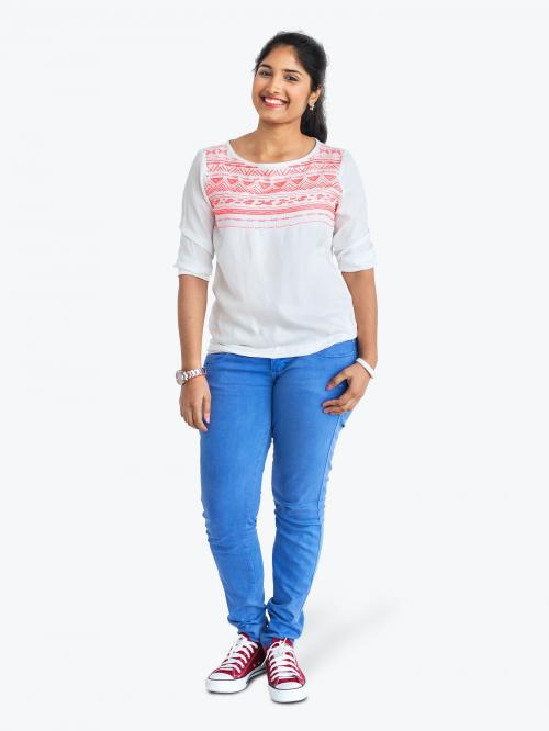 Cheerful Indian young woman in jeans character isolated on a white background - 591375