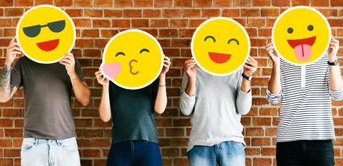 People holding positive emoticons - 537748