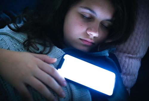 Girl fast asleep with her phone on her chest - 539093