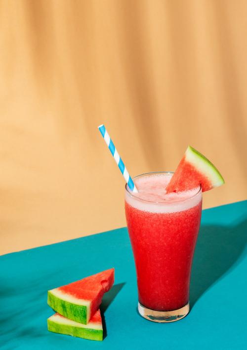 Fresh watermelon smoothie on colorful background - 2287289