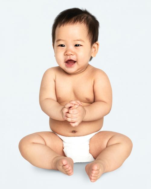 Cheerful baby in a studio - 546220