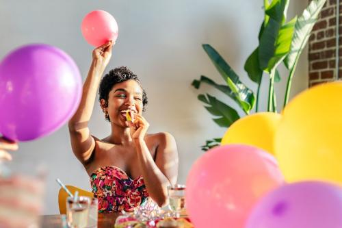 Young woman celebrating at a party - 2097484