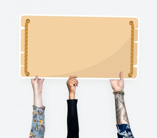 Hand holding a blank signage cardboard prop - 526531