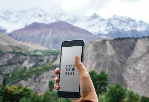 Mobile phone mockup design by the Himalaya mountains - 532183