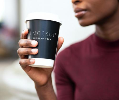 Woman drinking coffee out of a paper cup mockup - 532521