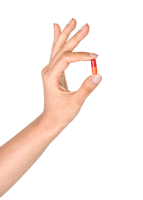 Hand holding a colorful pill transparent png - 2052996