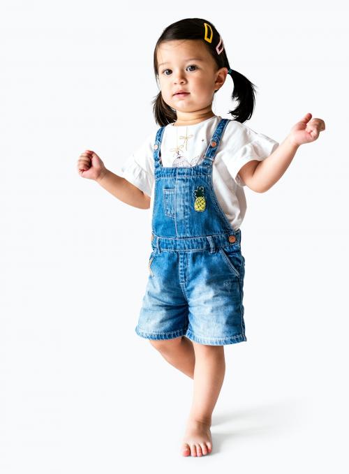 Cute little mixed race girl walking - 536042