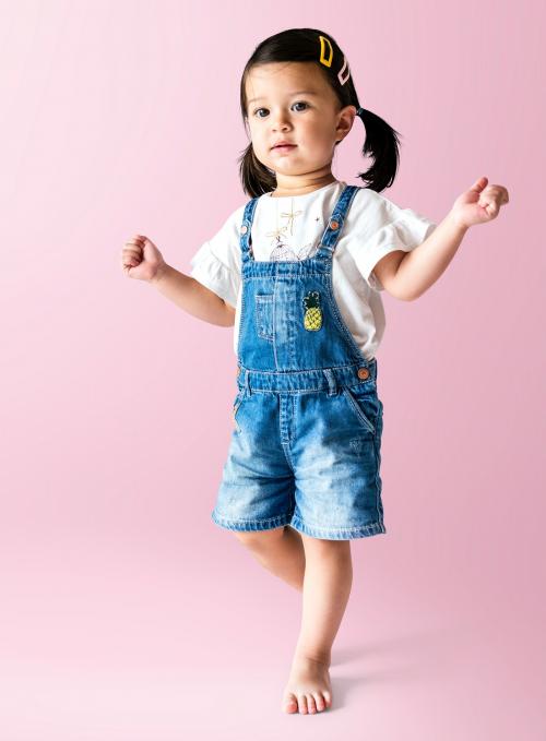 Cute little mixed race girl walking - 536045
