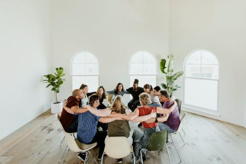 Diverse people in a support group session - 2194583