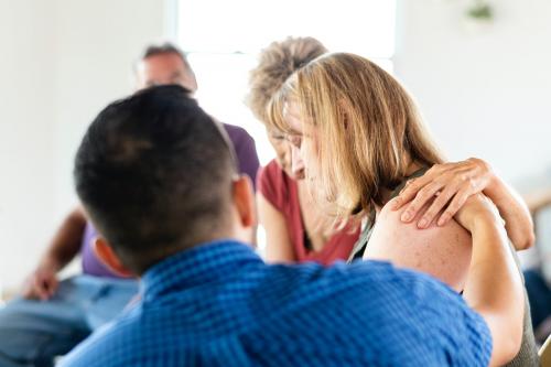 Diverse people in a support group session - 2194671