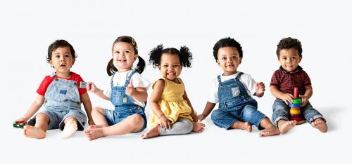 Cute diverse toddlers sitting together on the floor - 536065
