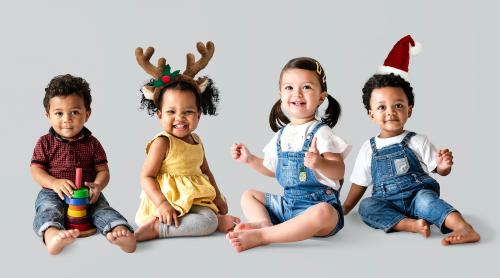 Cute diverse toddlers sitting together on the floor - 536074