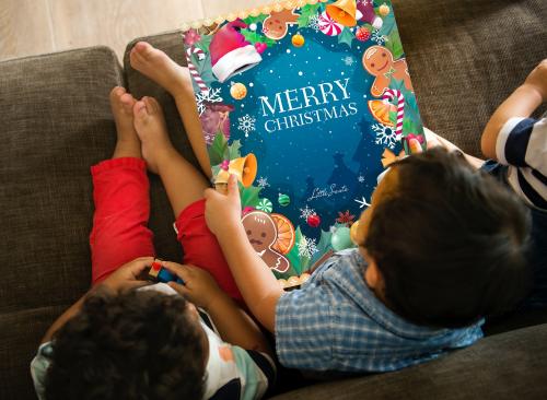 Young kids reading a Christmas story together - 536138