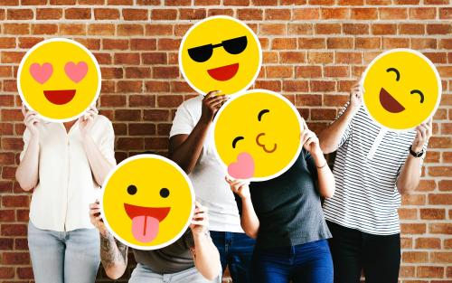 People holding positive emoticons - 537760