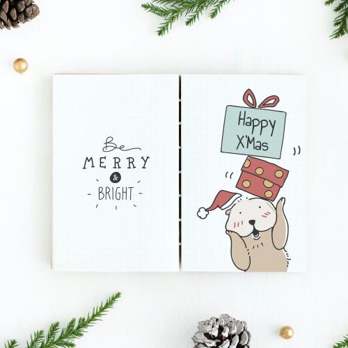 Christmas illustrations in a notebook mockup - 520020