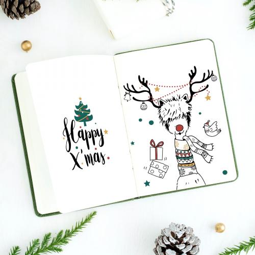 Christmas illustrations in a notebook mockup - 520084
