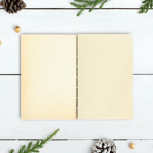 Blank notebook on a Christmas table mockup - 520092