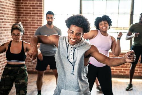 Diverse people in an active dance class - 2041654