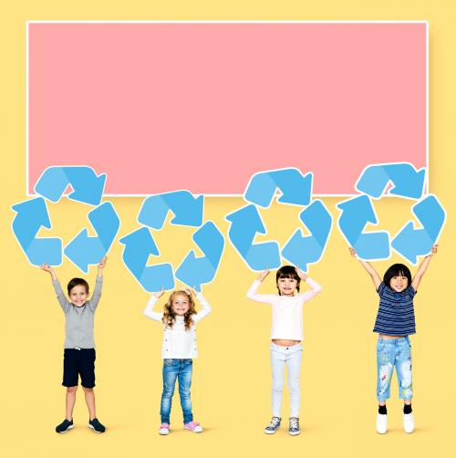 Diverse kids holding recycling icons - 504095