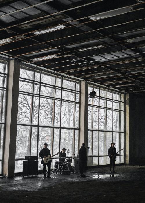 Rock band rehearsing in an abandoned building - 2024960