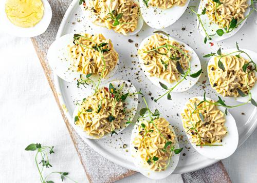 Deviled eggs on a white plate - 2269684