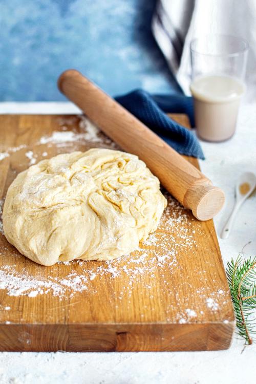 Fresh dough by a rolling pin - 2040725