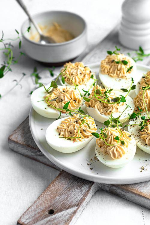 Deviled eggs on a white plate - 2269696