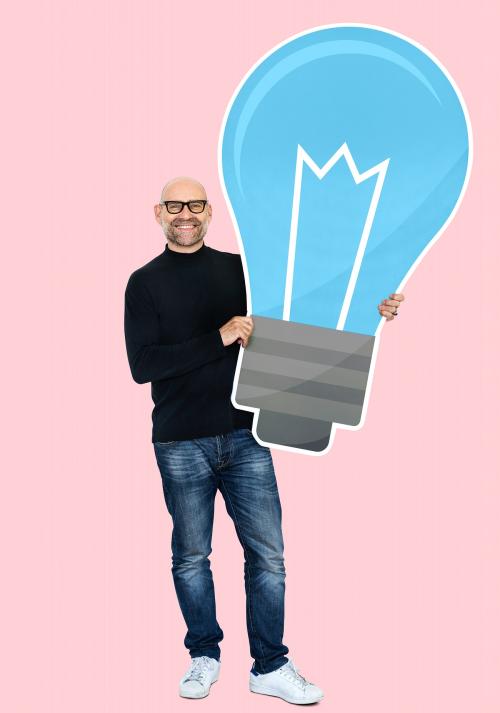 Happy man with a light bulb icon - 492889
