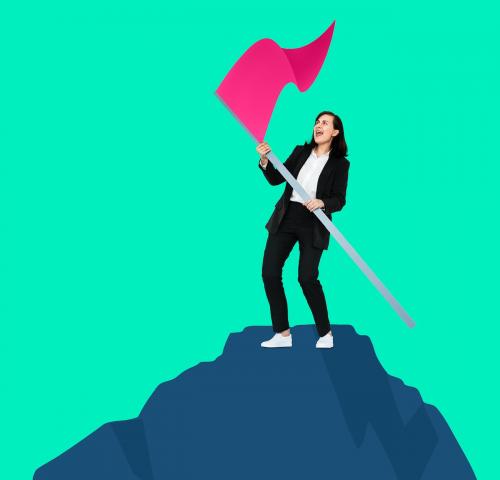 Business woman holding a flag on the mountain - 493040
