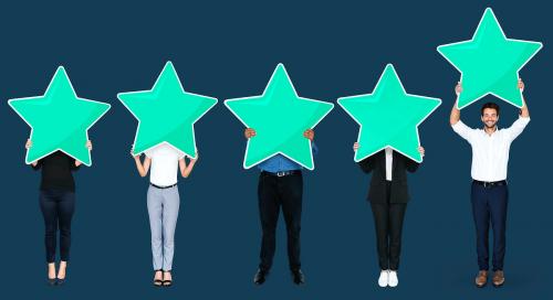 Diverse businesspeople showing star rating symbols - 493056