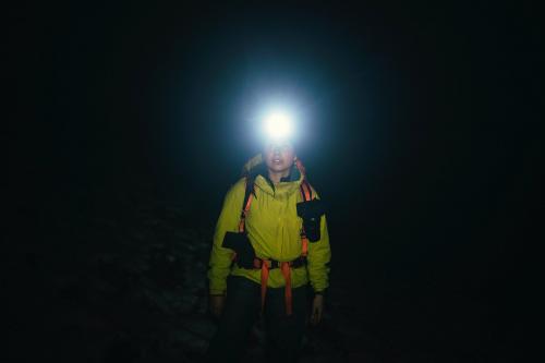 Mountaineer trekking in the cold night at Glen Coe, Scotland - 2221546
