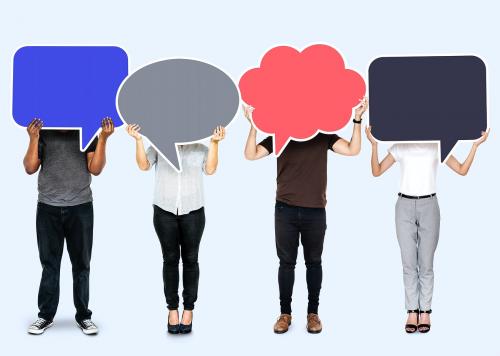 People holding colorful speech bubbles - 493210