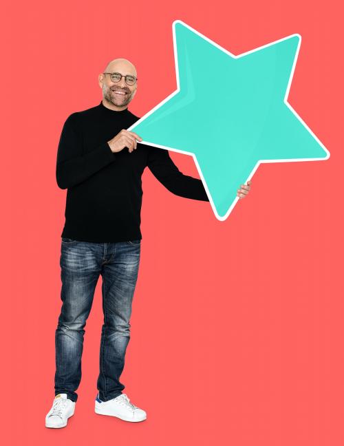 Cool man holding a star icon - 492203