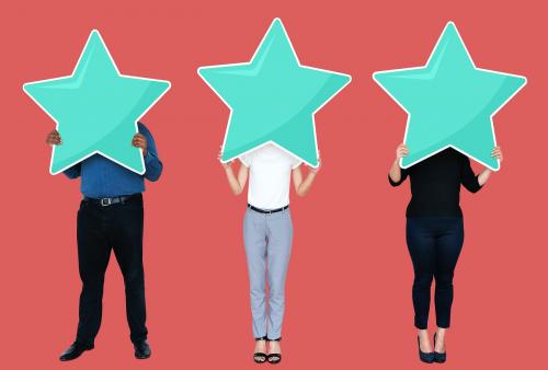 Diverse businesspeople showing a star rating symbol - 492443