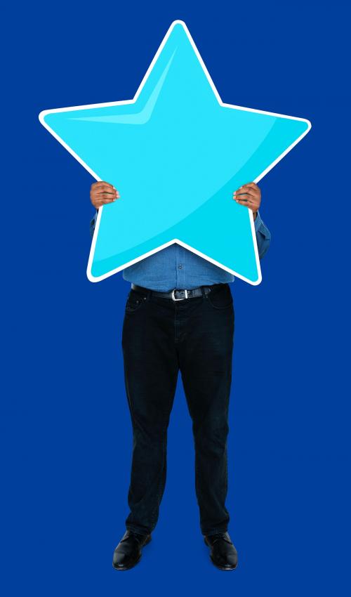 Businessman showing a star rating symbol - 492614