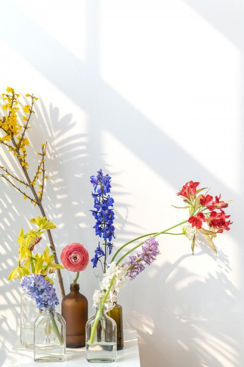 Flower vases on a white table - 2276468