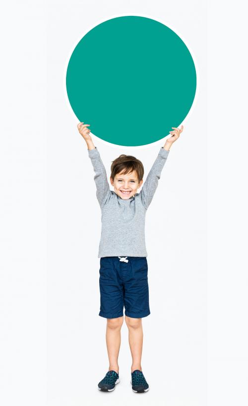 Happy kid holding an empty round board - 491740