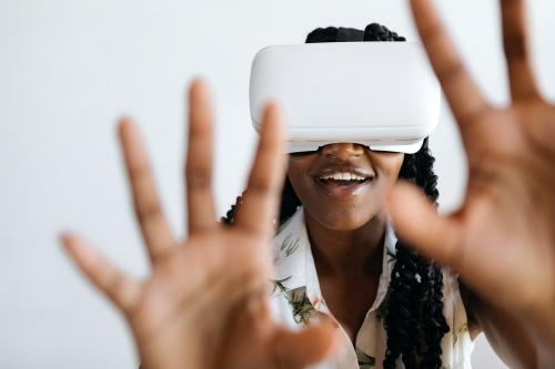 Black woman enjoying a VR headset - 2030431