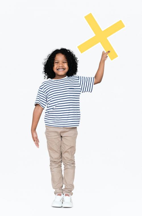 Cheerful boy holding a multiplication sign - 491823